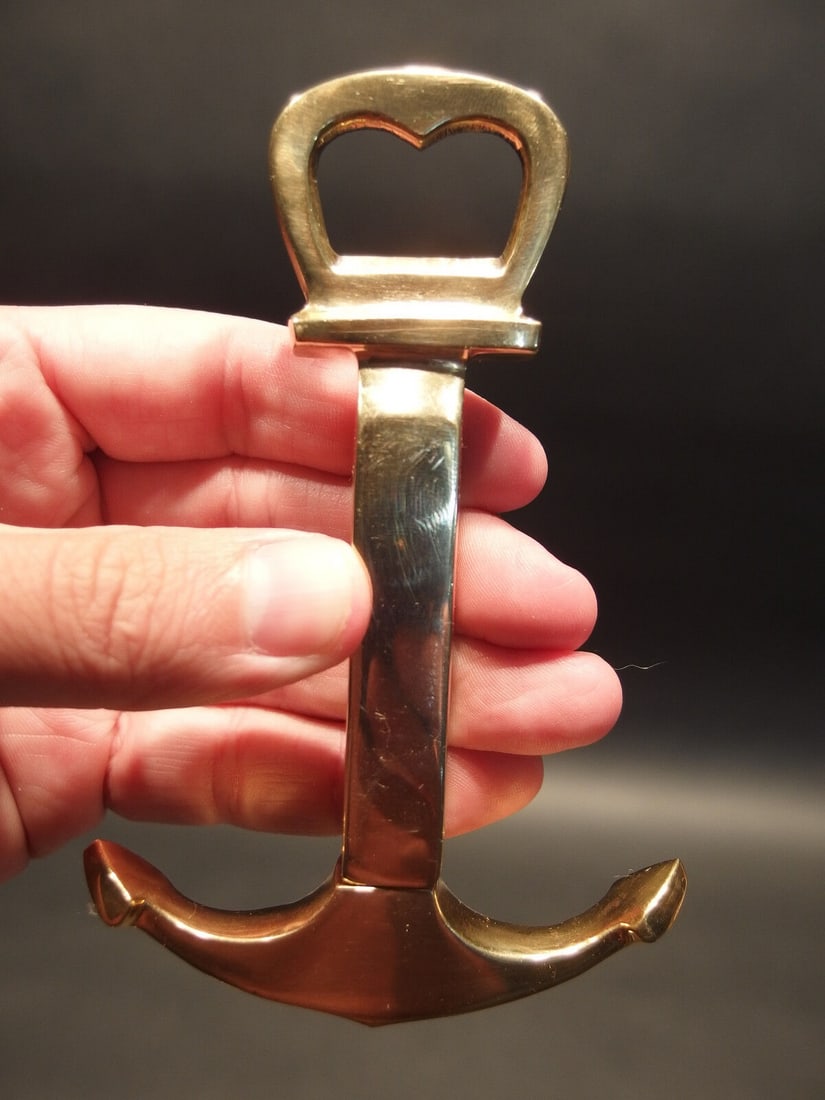 Brass Nautical Ships Boat Anchor Wine Beer Bottle Opener: 4 7/8" long x 3 1/8" Wide Very accurate and well made reproduction of an antique wine and beer bottle opener. All solid brass! Certainly easy to wonder its age Reserve: $15.00 Shipping: Domestic: Flat