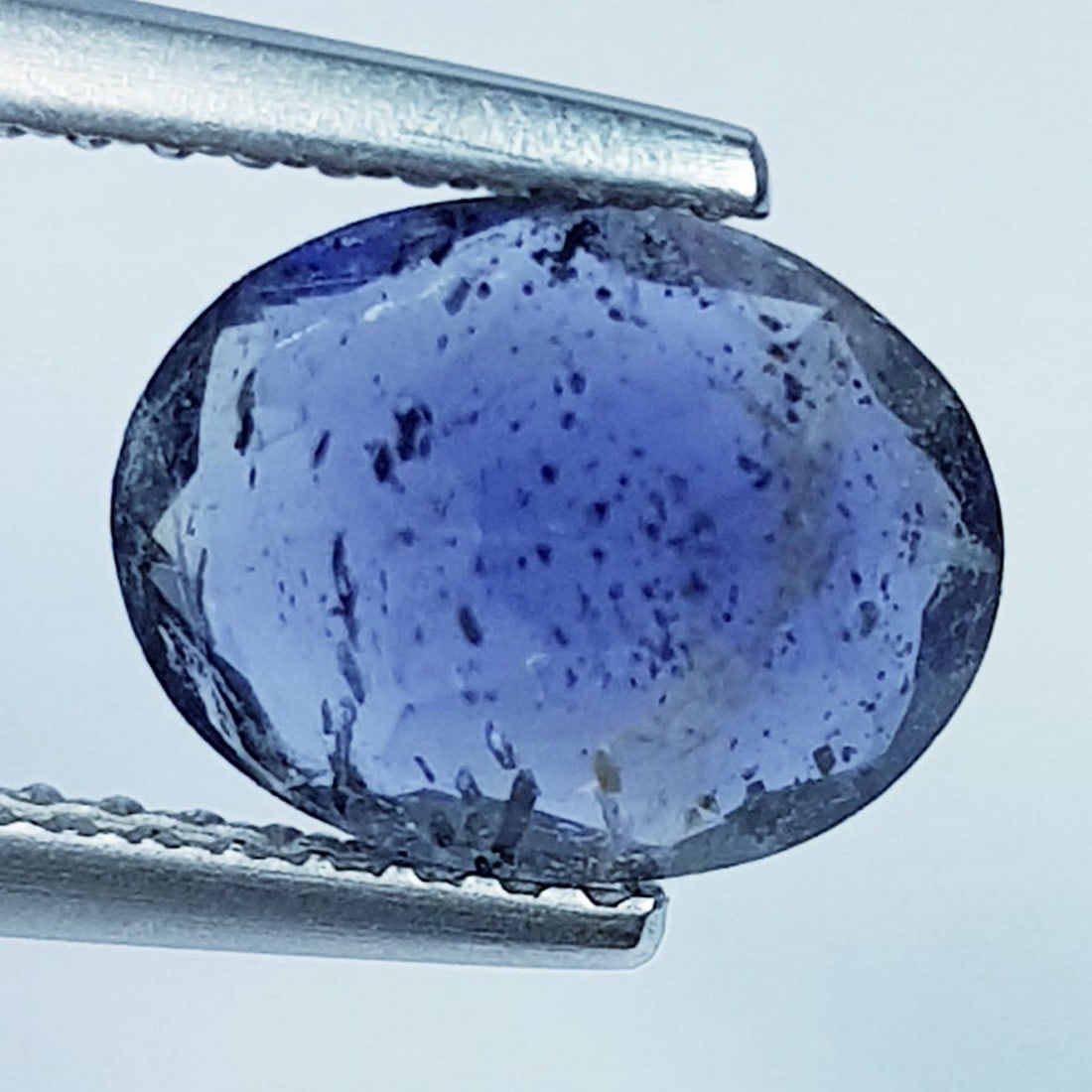 1.72 Ctz "Fine Collection" Natural Iolite: No Reserve! Title: 1.72 Ctz "Fine Collection" Natural Iolite Color/Clarity: Blue / VS Gemstones: Iolite Carat Weight: 1.72 Size/Dimensions: 9.20 x 7.10 x 4.70 Additional Info: Oval - Africa Shipping: