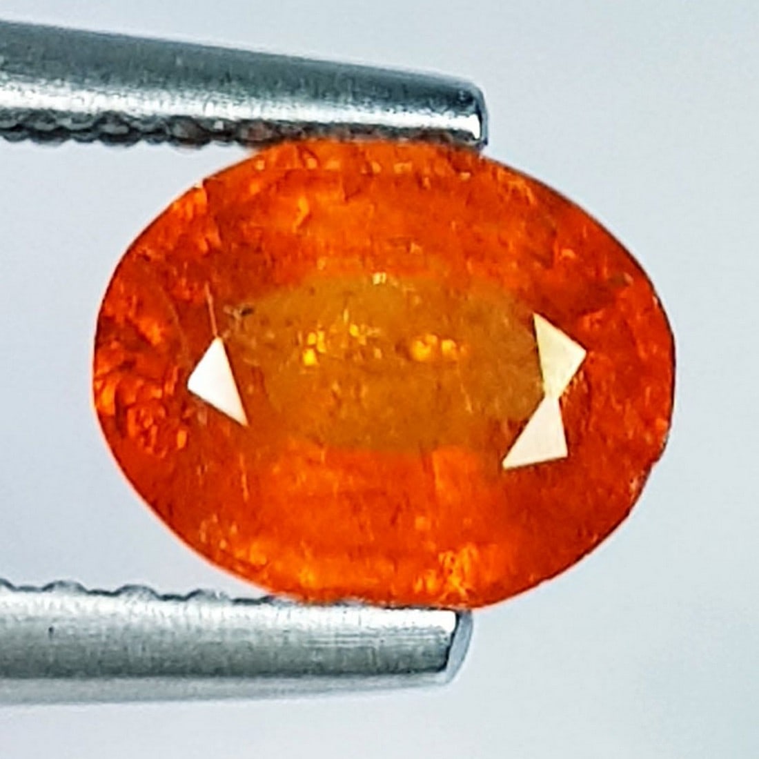 1.30 ctz" Beautiful Fanta Orange " Natural Spessartite Garnet: No Reserve! Title: 1.30 ctz" Beautiful Fanta Orange " Natural Spessartite Garnet Color/Clarity: Orange / VS Gemstones: Garnet Carat Weight: 1.3 Size/Dimensions: 7.00 x 5.80 x 3.50 Additional Info: Ova