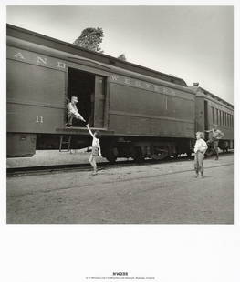 O. WINSTON LINK - Ralph White Passes Out Lollipops: Artist: O. Winston Link Title: Abingdon Branch, Ralph White Passes Out Lollipops to Children At Green Cove, Virginia, 1955 Medium: Photo Litho, 2019, Germany Dimensions: 8.45x8.15" Description: Unmoun