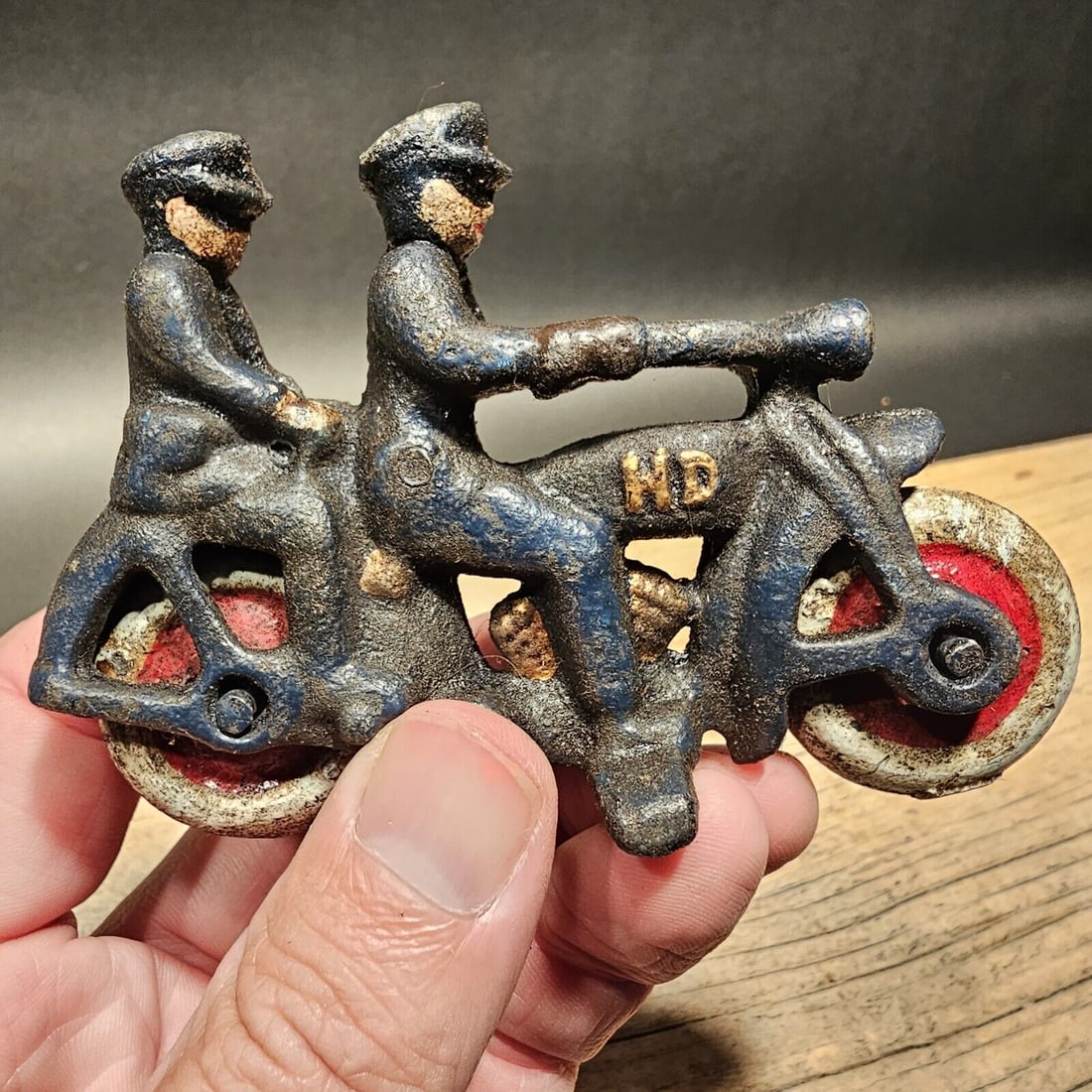 4" Cast Iron Toy Motorcycle: 4" Long x 3" tall Such a neat reproduction cast iron motorcycle! As you can see this heavy cast iron pull toy motorcycle was wonderfully hand painted and distressed to look like an original antique. T