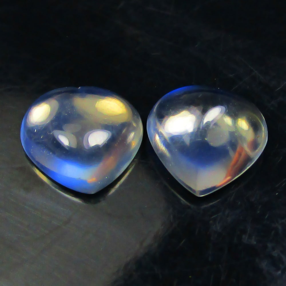 1.82 Ctw Natural Blue Moonstone Pair Loose Stones: Title: 1.82 Ctw Natural Blue Moonstone Pair Loose Stones Stone Clarity: Transparent Gemstones: Natural Moonstone Beads Carat Weights: 1.82 Size/Dimensions: 7.10 x 7.10 x 3.30 mm Additional Information