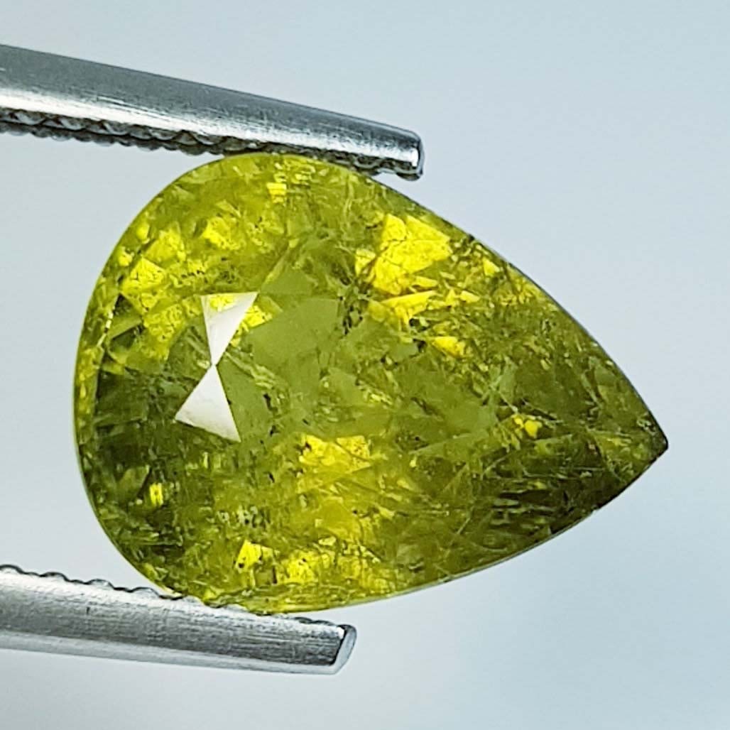 Natural Mali Garnet Pear Cut - 4.87 ct: Title: Natural Mali Garnet Pear Cut - 4.87 ct Gemstones: Mali Garnet Color/Clarity: Green /SI Carat Weights: 4.87 Size: 11.40 x 8.90 x 6.70 Additional Information: Pear - Mali Reserve: $97.00 Shipping