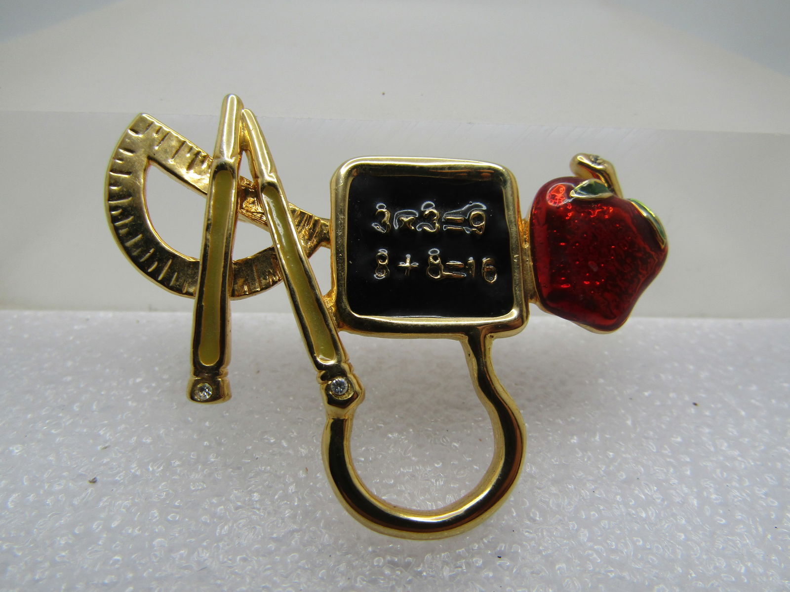 Vintage Teachers Brooch, Apple & More, Holds Glasses 1970's-1980's: Vintage Teachers Brooch, Apple & More, 1970's-1980's. This has a look on the blackboard where you can slip your glasses through to hold when not needed or attach a key to - there is a compass and two