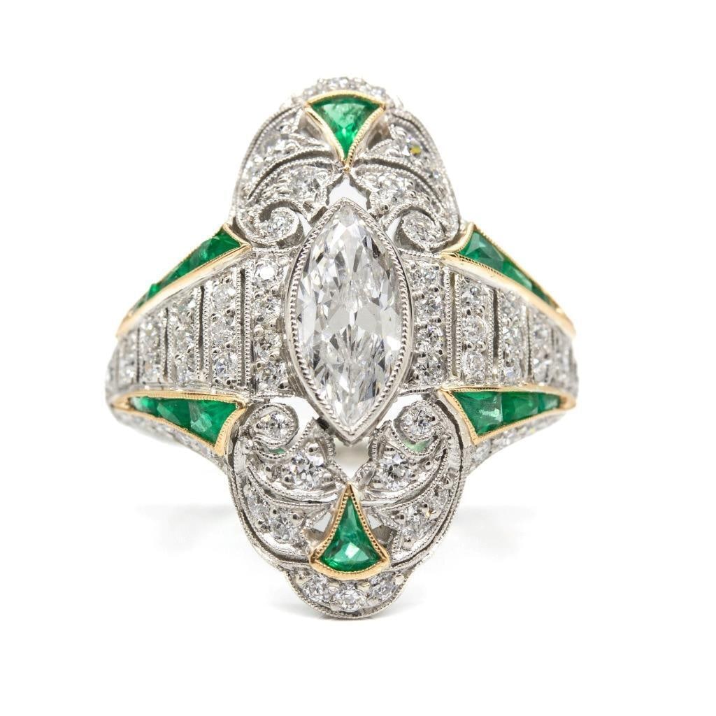Art Deco Handmade Platinum Old Mine Diamond and French cut Emerald Ring: Art Deco Handmade Platinum Old Mine Diamond and French cut Emerald Ring Description The Avery ring is an authentic vintage piece handmade in the Art Deco era circa 1920. It centers 1 old mine marquise