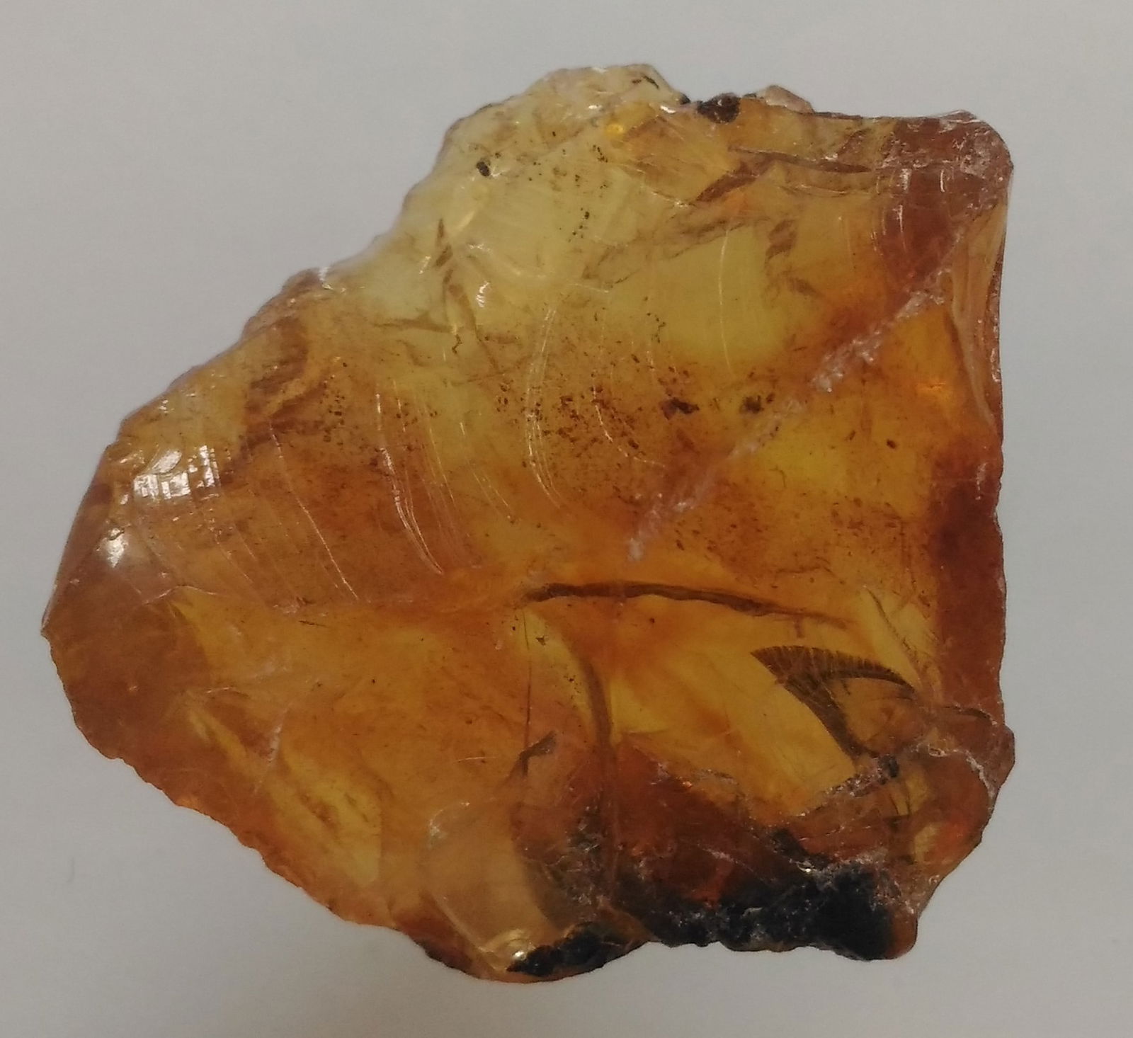 2.62 Gram 100 Mill. Years Old Rough Burmite Amber: Title: 2.62 Gram 100 Mill. Years Old Rough Burmite Amber Origin: Hukawang Valley, Kachin State, Myanmar Size: 2.5x2x0.7 cm / 2.62 gram Description: clear yellow rough burmite amber with natural cracks