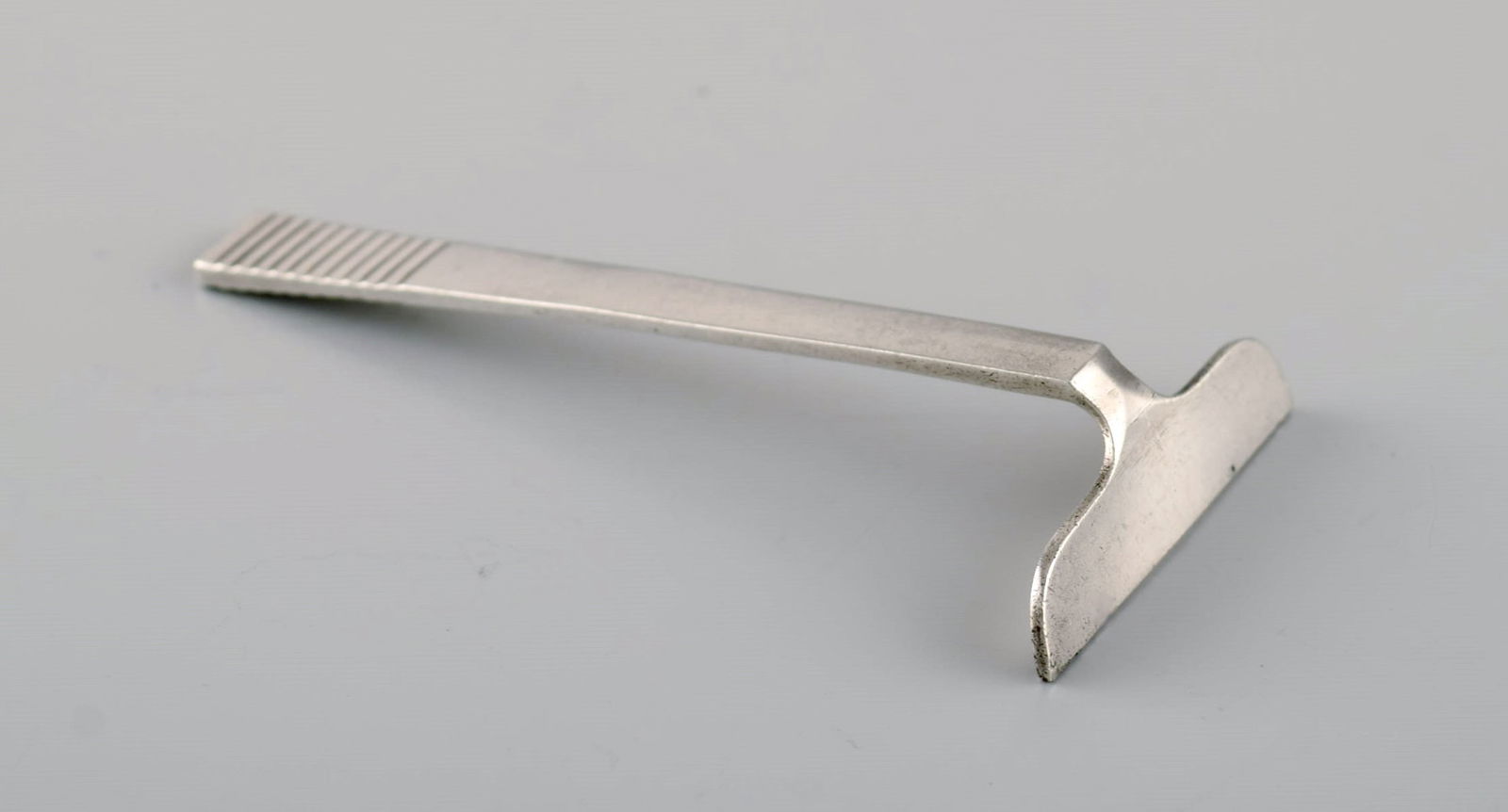 Georg Jensen Parallel / Relief. Rare child's pusher in sterling silver. Dated 1933-44. (1 of 5)