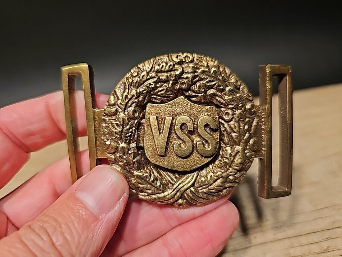 Civil War VSS Belt Buckle Brass: 2 3/4" long x 1 3/4" This all brass replica belt plate will surely make you wonder its age. It is made to look just like an antique The face of this plate has a very pleasing brown patina with slight