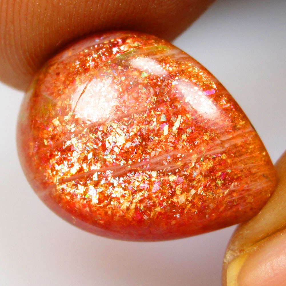 14.58 Ctw Natural Sunstone Catseye Pear Cab: No Reserve! Title: 14.58 Ctw Natural Sunstone Catseye Pear Cab Stone Clarity: Opaque Gemstone:Natural Sunstone Catseye Carat Weight: 14.58 Size/Dimensions: 19.10 x 14.90 x 7.10 mm Additional Info:Exce