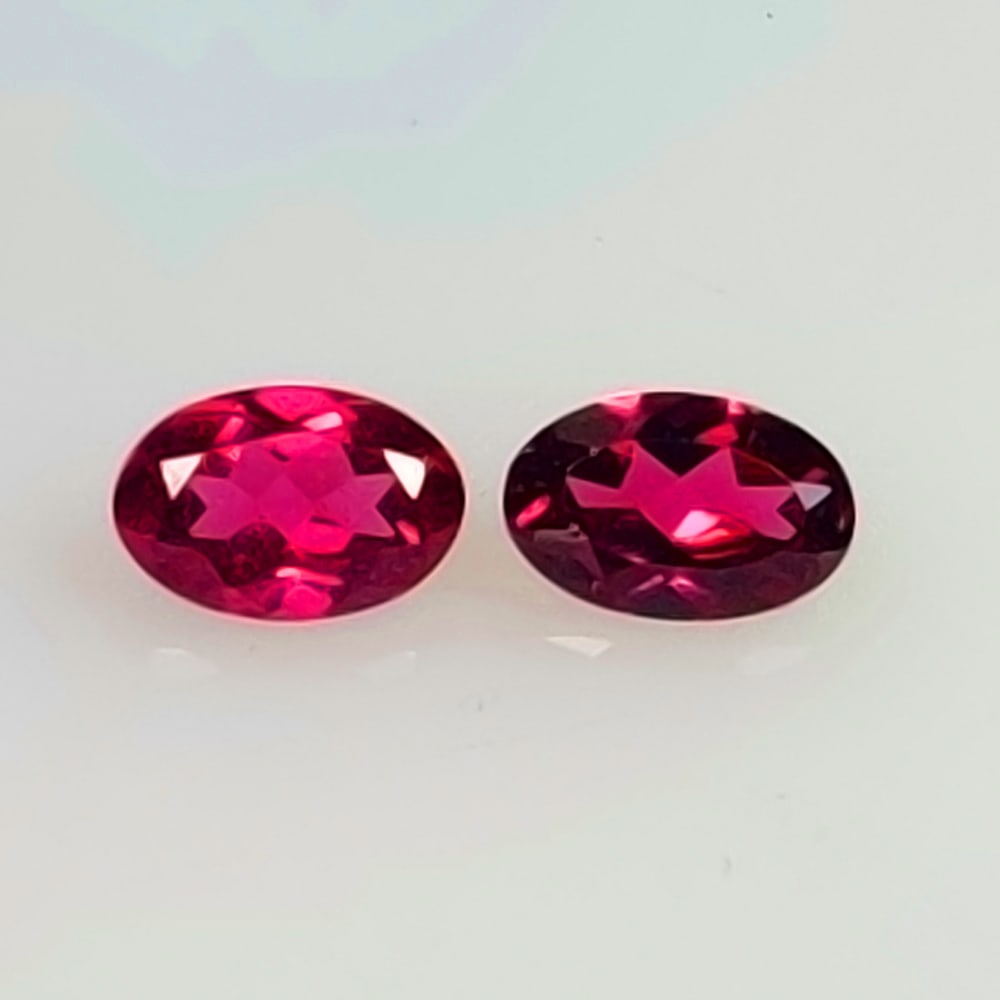 1.12 Ctw Natural Rhodolite Garnet Oval Pair: No Reserve! Title: 1.12 Ctw Natural Rhodolite Garnet Oval Pair Stone Clarity: VVS Gemstone:Natural Rhodolite Garnet Carat Weight: 1.12 Size/Dimensions: 6.20 x 4.10 x 2.70 mm / 2 Pc's Additional Info:P
