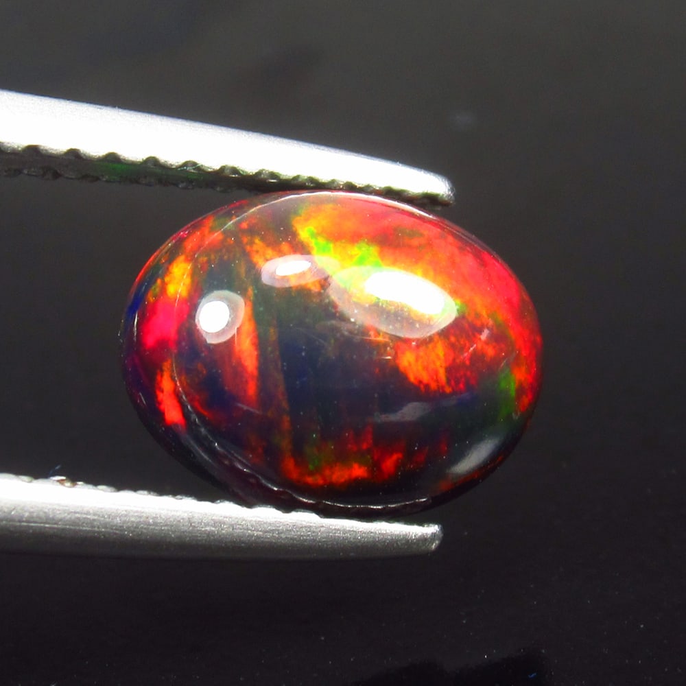 1.21 Ct - Natural Black Fire Opal (1 of 3)