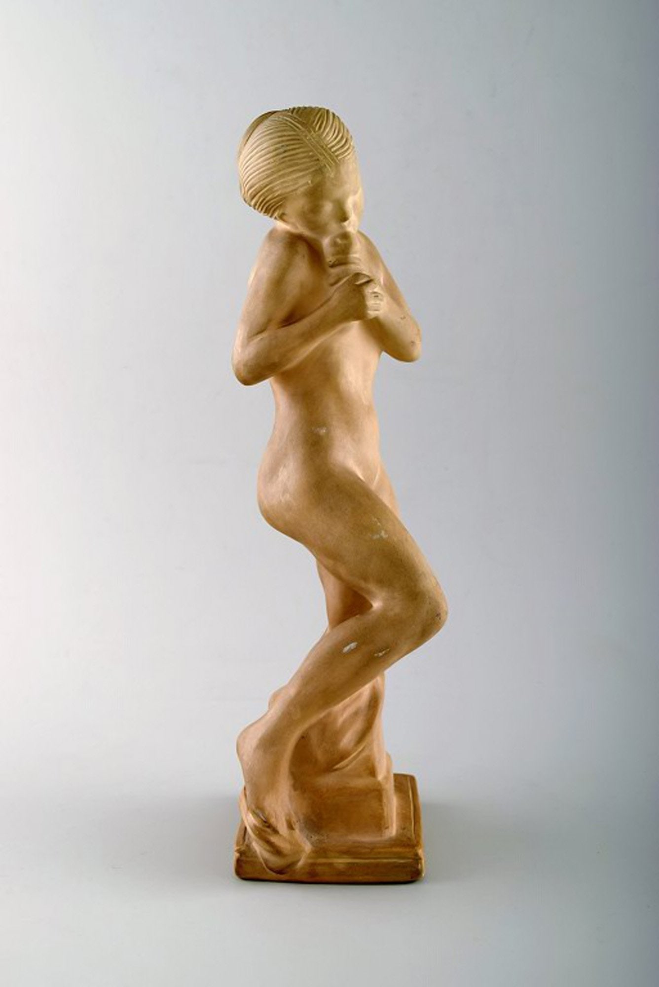 Kai Nielsen for Kähler. "Eve with the apple" Figure in earthenware.: Kai Nielsen for Kähler. "Eve with the apple" Figure in earthenware. Signed HAK Denmark. Manufactured by Kähler. Height 30 cm. Width 10 cm. In perfect condition. Reserve: $350.00 Shipping: Do