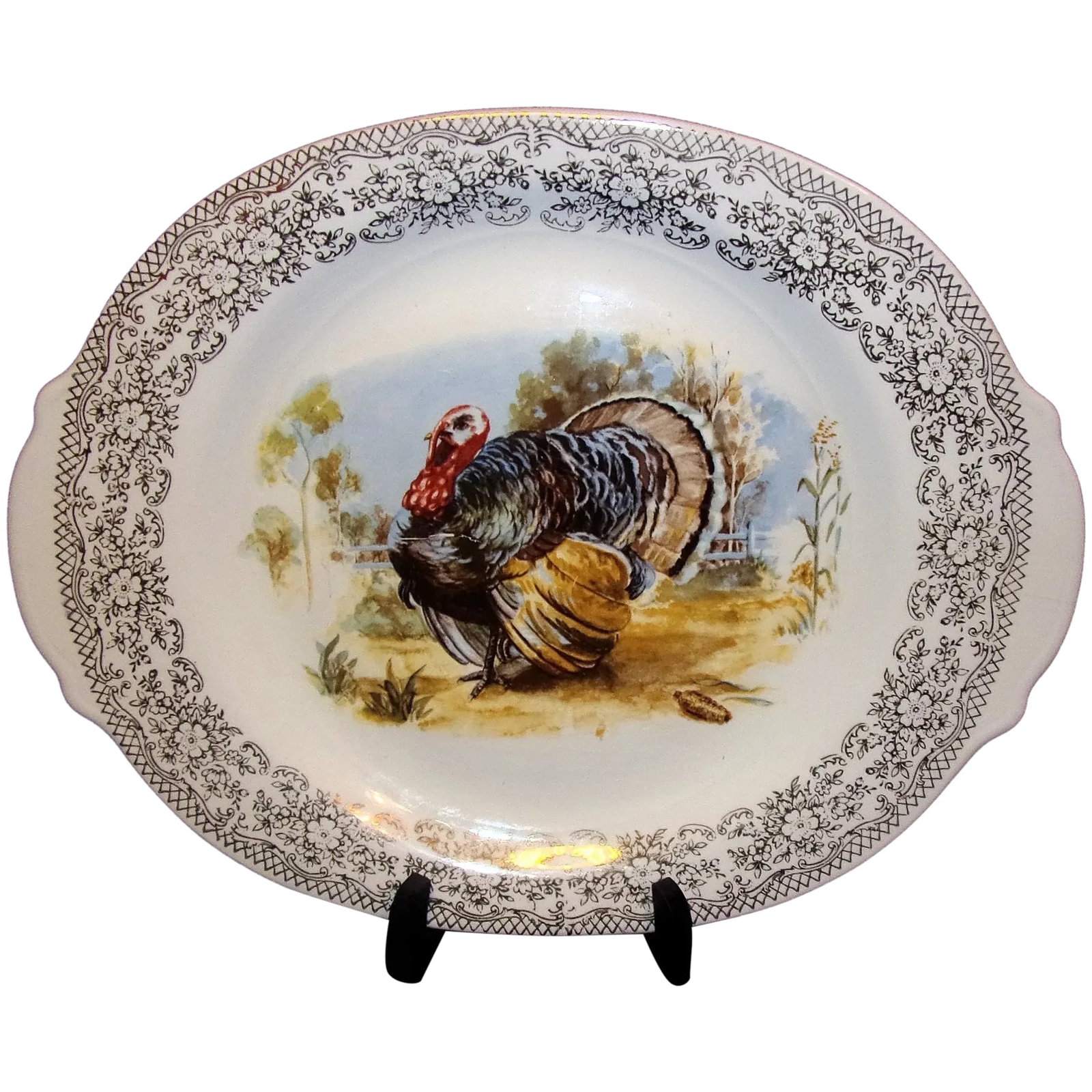 Vintage Small Turkey Platter: This is a classic Vintage Small Turkey Platter measuring 14” x 11”. Would be great for a small turkey or large hen. I know most people use turkey platters only during the holiday season bu