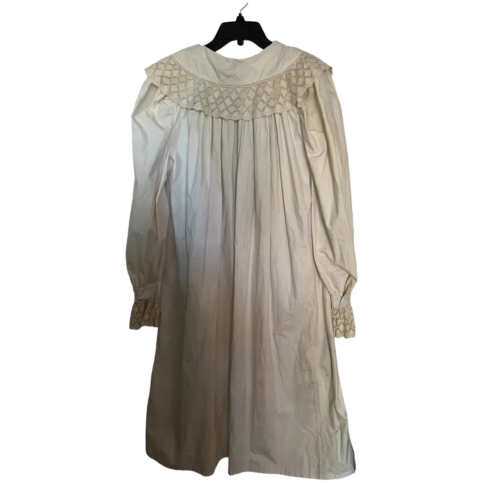 Antique Victorian cotton Nightgown mid 19th century civil war: Made of off white, heavyweight cotton muslin with french seaming. The collar and center front of the bodice are decorated with wonderful whitework t embroidery, or broderie Anglaise. The embroidery pa