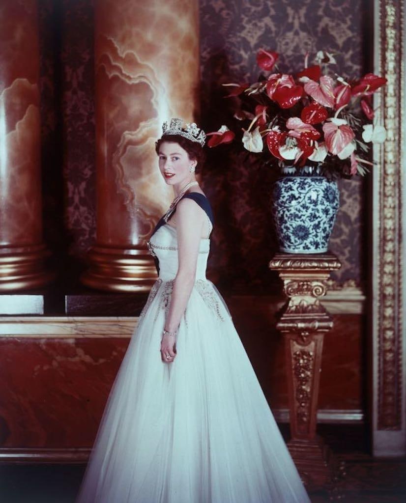 V&A Museum London 'Queen Elizabeth II' by Cecil Beaton 1955 (printed later): Queen Elizabeth II' by Cecil Beaton (1904-80) Queen Elizabeth II in full formal regalia of sash, ballgown, and tiara, England, 1955. © Victoria and Albert Museum, London Paper size 24 x 20 inches