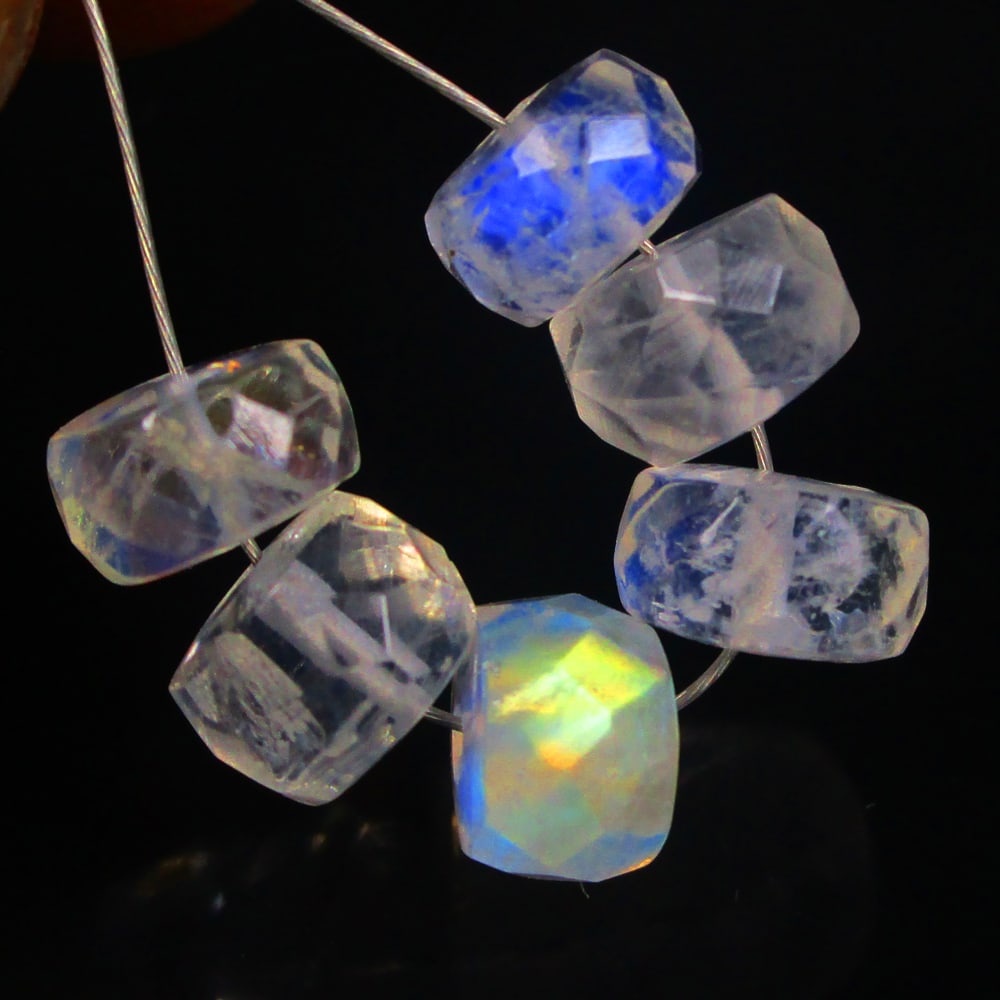 8.37 Ctw Natural 6 Drilled Blue Moonstone Round Beads: No Reserve! Title: 8.37 Ctw Natural 6 Drilled Blue Moonstone Round Beads Stone Clarity: Semi-Transparent Gemstone:Natural Moonstone Beads Carat Weights: 8.37 Size/Dimensions: 6.80 - 7.10 mm / 6 PC's A