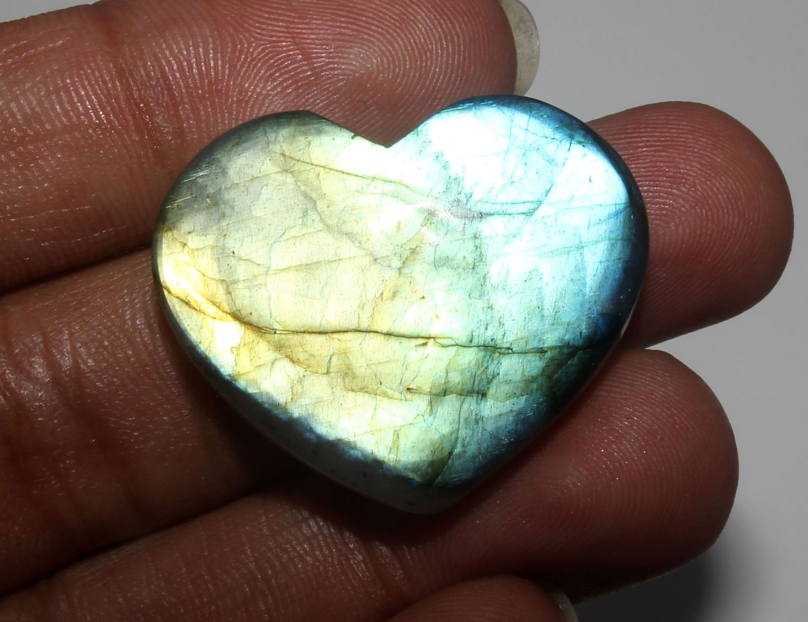 Awesome " Natural Labradorite " 53.09 Cts Natural Labradorite: No Reserve! Title: Awesome " Natural Labradorite " 53.09 Cts Natural Labradorite Additional Info: Gemstone : Natural Labradorite Shape and cut : Heart Cabochon Origin : Africa Weight in carats : 53.09