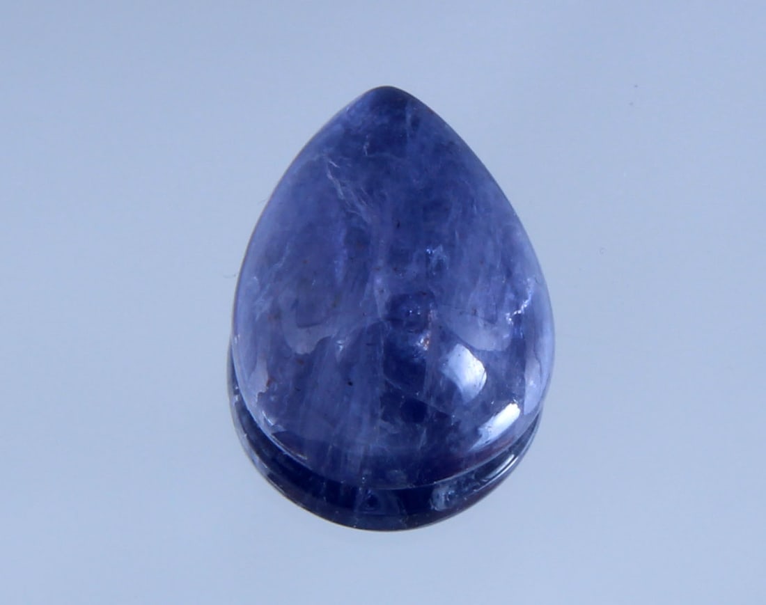 Gorgeous " Natural Iolite Violet " 2.33 Cts Natural Iolite: No Reserve! Title: Gorgeous " Natural Iolite Violet " 2.33 Cts Natural Iolite Additional Info: Gemstone : Natural Iolite Shape and Cut : Pear Cabochon Weight : 2.33 carats Measurements : 9.68x7.63x4.6