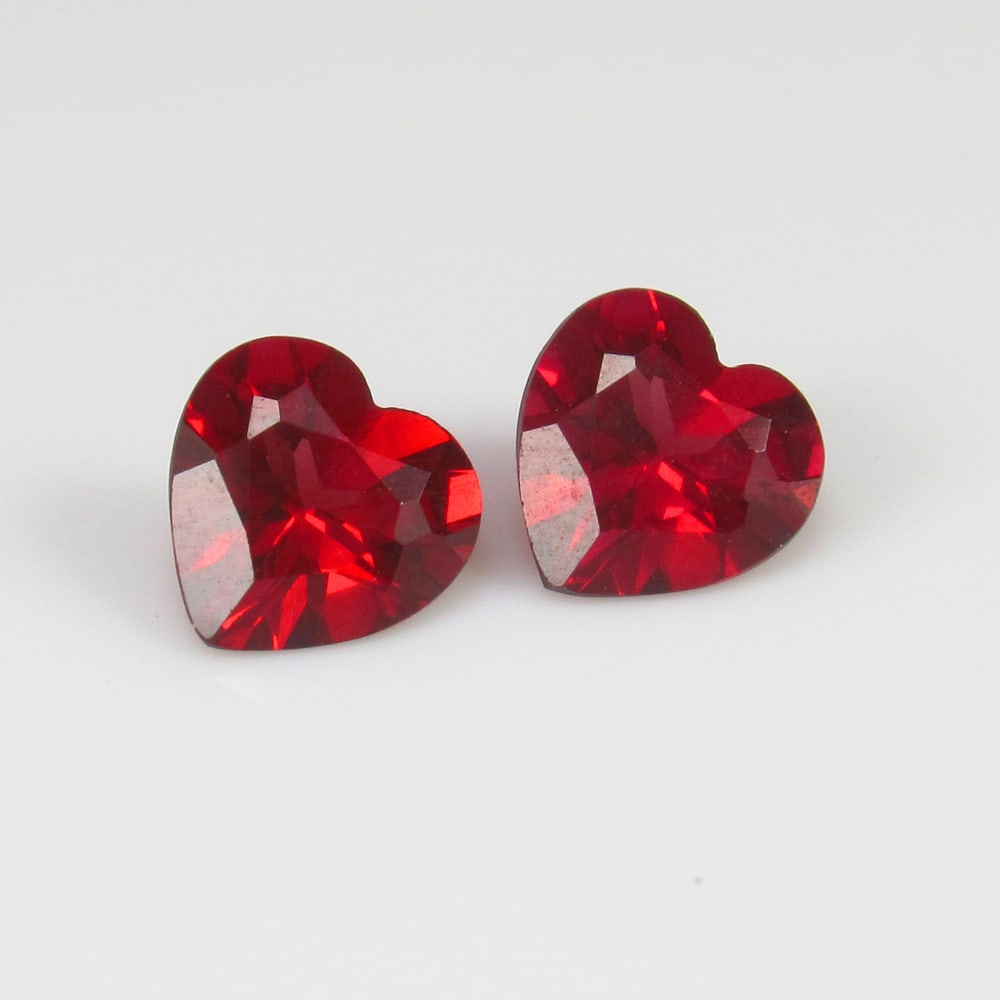 1.78 Ct - Natural Rose Garnet Pair: No Reserve! Title: 1.78 Ct - Natural Rose Garnet Pair Description: Gemstone Gemstones:Garnet Carat: 1.78 Size/Dimensions: 6.0 x 6.0 x 3.5 mm Additional Info:Pieces : 2 No's / Shape : Heart Cut / Color