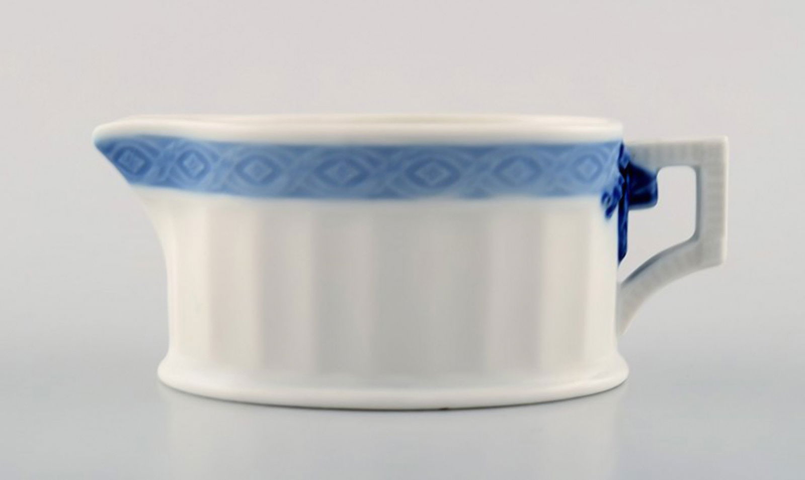 Royal Copenhagen Blue Fan, Creamer.: Royal Copenhagen Blue Fan, creamer. Designed by Arnold Krog in 1909. Decoration Number 1212/11562. Measures: 10.5 cm x 4.5 cm. In Perfect condition, 1st factory quality.