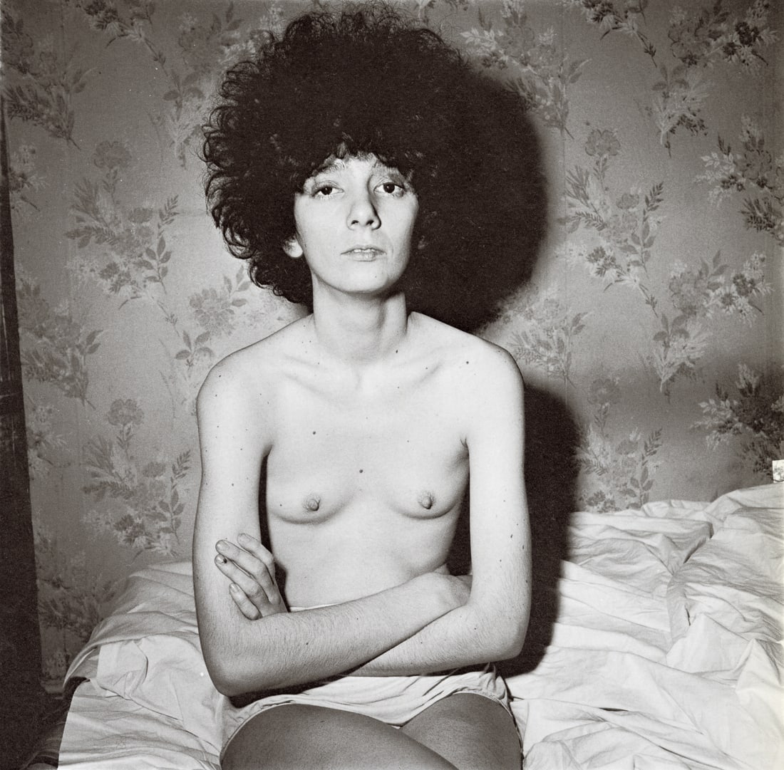 DIANE ARBUS - Girl Sitting On Bed With Her Shirt Off: Artist: Diane Arbus Title: Girl Sitting On Her Bed With Her Shirt Off, NYC, 1968 Medium: Photo Litho, 1972, USA Dimensions: 8.4x8.25" Description: Heat Wax Mounted on 11x14" Conservation Board Artist 