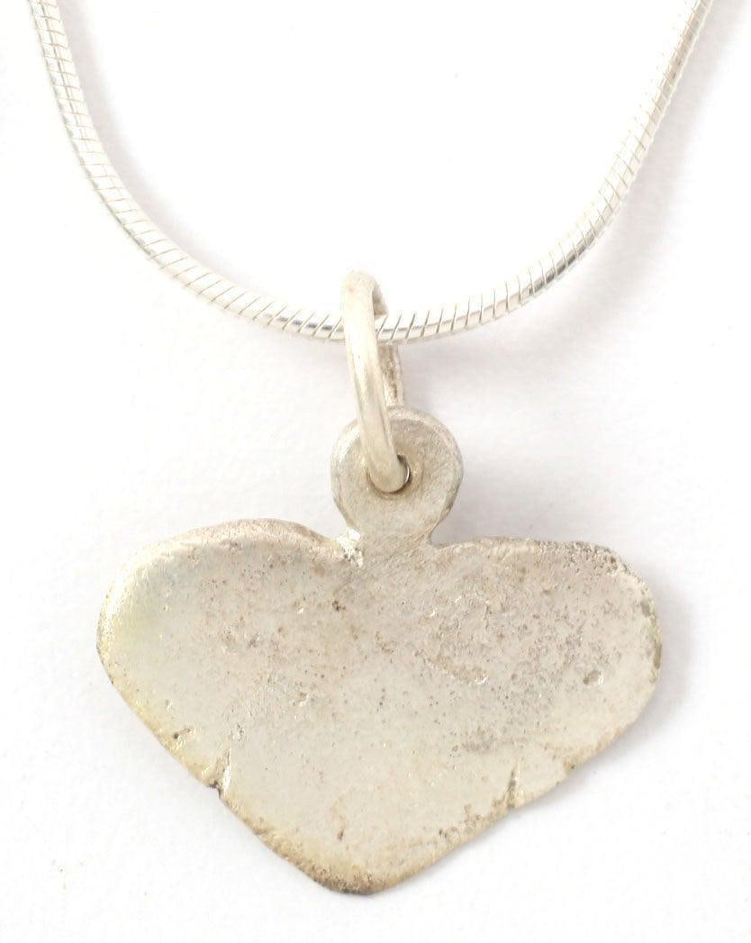 GOOD VIKING HEART NECKLACE 9th-10th CENT AD: Broad, full, very flat section, and fully evolved form. 3/4” width with a shallow top cusp. For Vikings, the heart stood for bravery, fortitude, loyalty, integrity, all attributes of the warrior