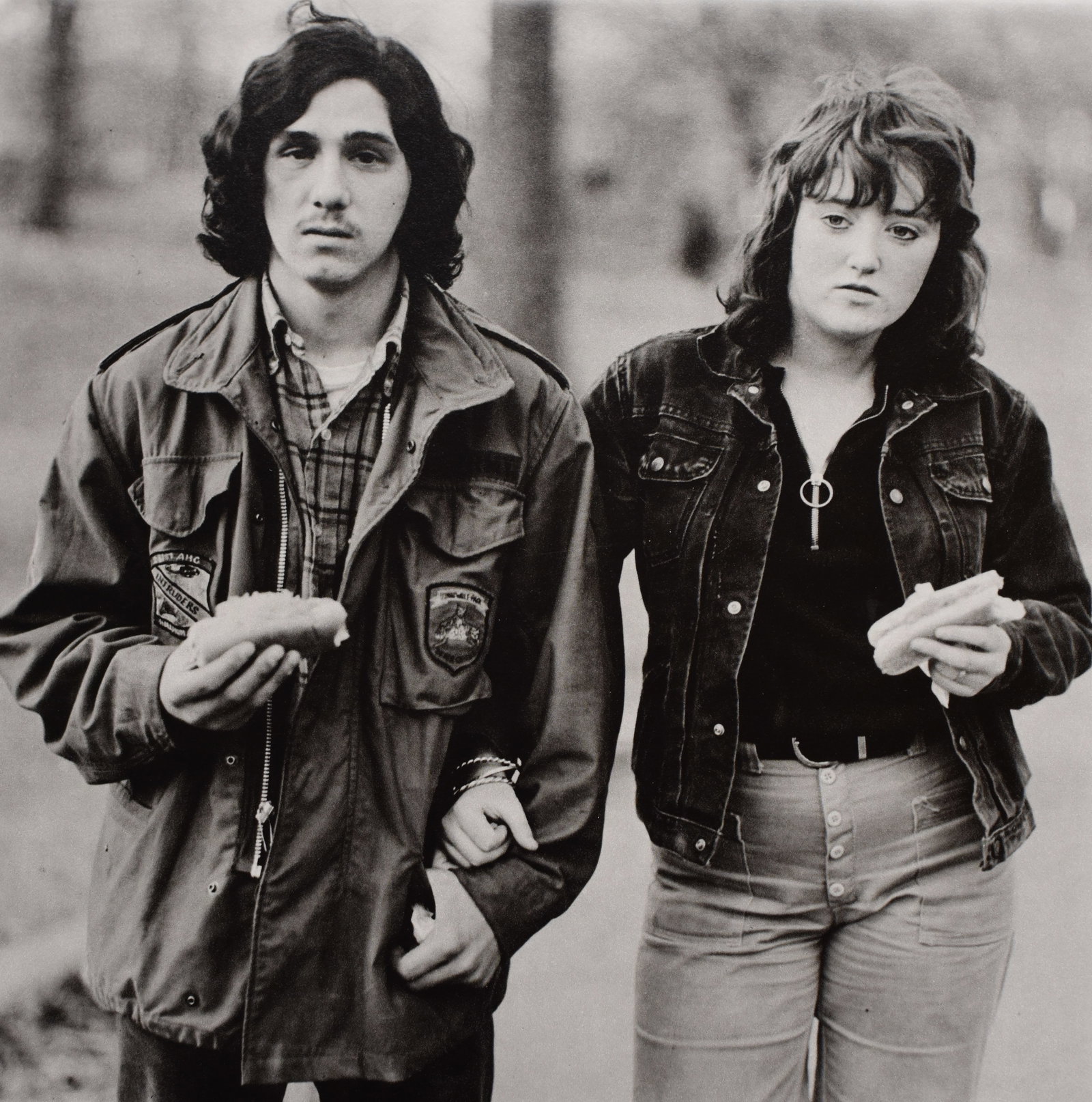 Diane Arbus - Young Man with Girlfriend: Artist: Diane Arbus Title: Young Man with Girlfriend Date Printed: Printed in 1979 Heavy weight paper Medium: Vintage Photogravure Limited Edition Printer Location: Center of Photography New York - De