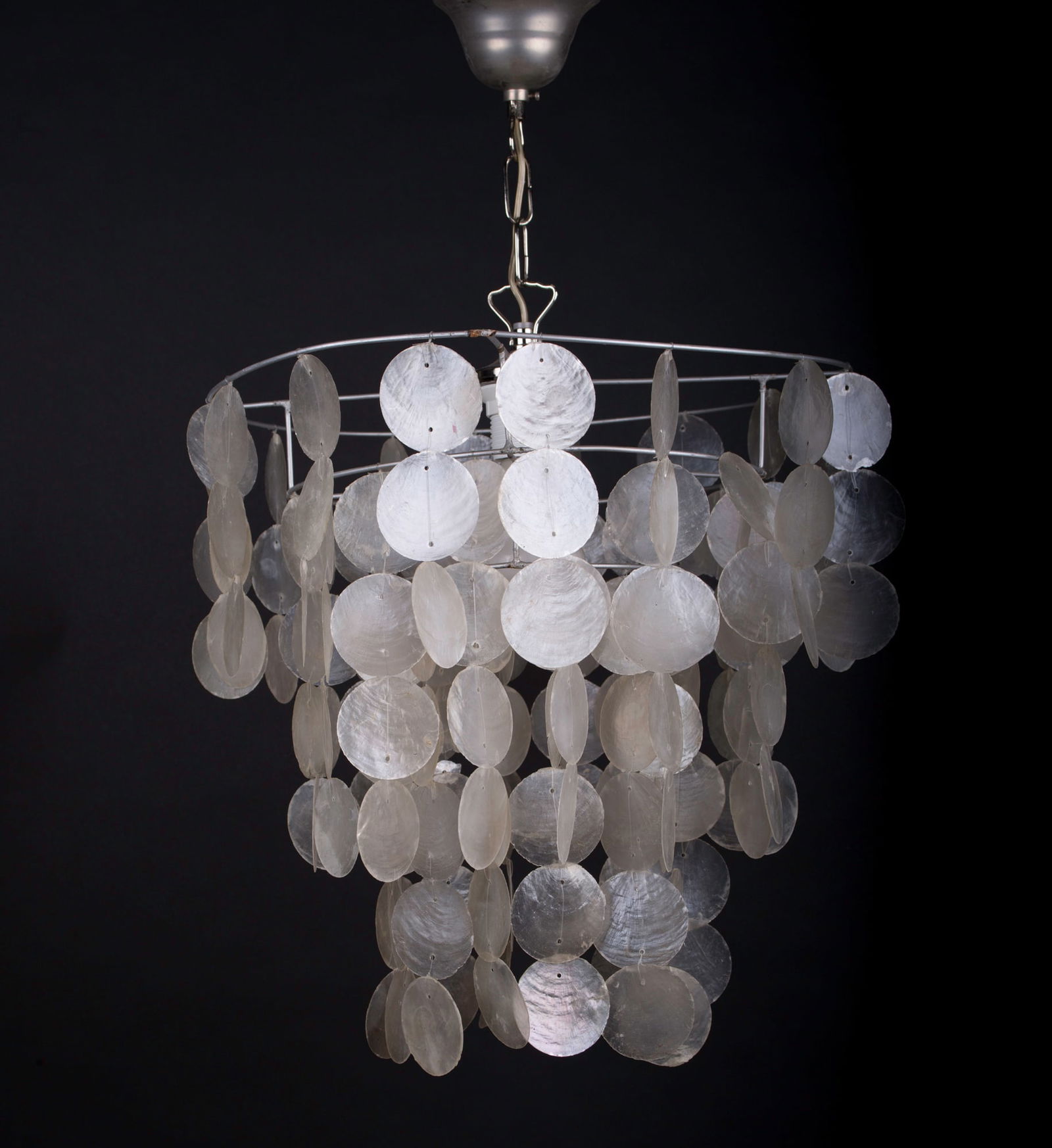 In the manner of Verner Panton pair of shells chandeliers: In the manner of Verner Panton pair of shells chandeliers , definitely inspited by his work , possibly his creation , the circle are inversed from his original design or it could have been a choice to