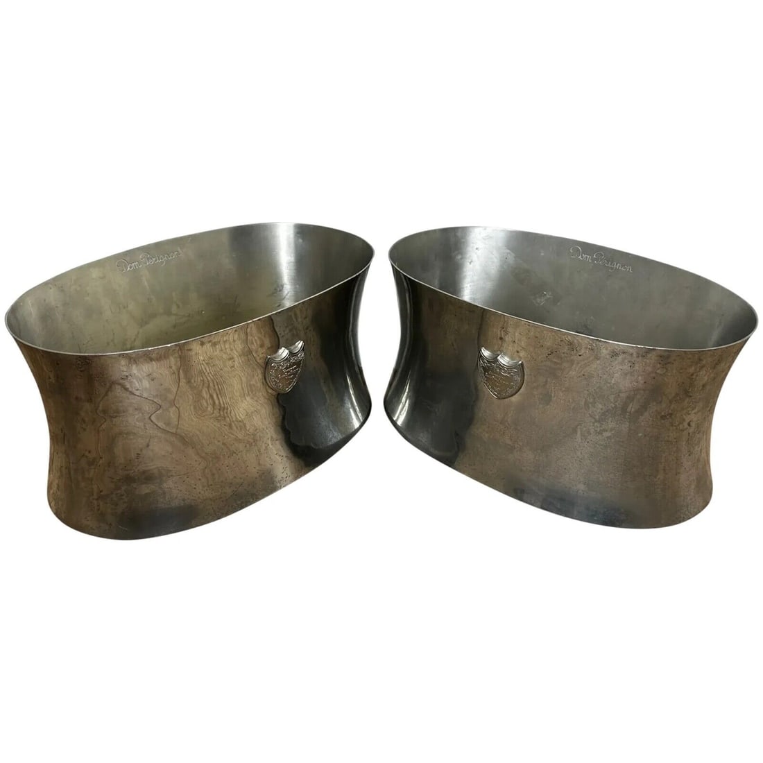 Pair Large Original Dom Perignon Champagne Coolers By Designer Martin Szekely: Pair Vintage Original Dom Perignon Champagne Coolers By Designer Martin Szekely. A feature that stands out is the fabulous curved shape of them so in vogue. Made from pewter metal and having a silver