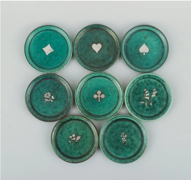 Wilhelm Kåge gets Gustavsberg. A set of eight "Argenta" bottle trays. (1 of 1)