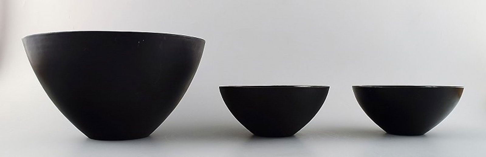 3 Krenit bowls by Herbert Krenchel. Black metal and black enamel.: Title: 3 Krenit bowls by Herbert Krenchel. Black metal and black enamel. Description: 3 Krenit bowls by Herbert Krenchel. Black metal and black enamel. 1970s. The bowls measures 25 cm. X 14.5 cm. And