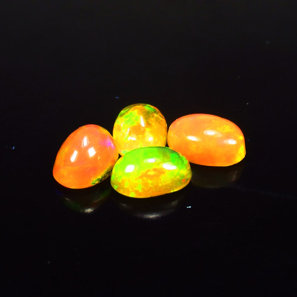 1.45 Ct - Natural Multicolor Opal Set (1 of 3)