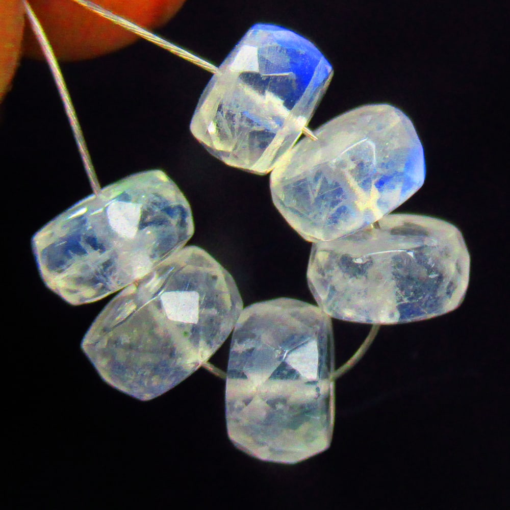 9.60 Ctw Natural 6 Drilled Blue Moonstone Round Beads: No Reserve! Title: 9.60 Ctw Natural 6 Drilled Blue Moonstone Round Beads Stone Clarity: Semi-Transparent Gemstone:Natural Moonstone Beads Carat Weights: 9.6 Size/Dimensions: 6.90 - 7.60 mm / 6 PC's Ad