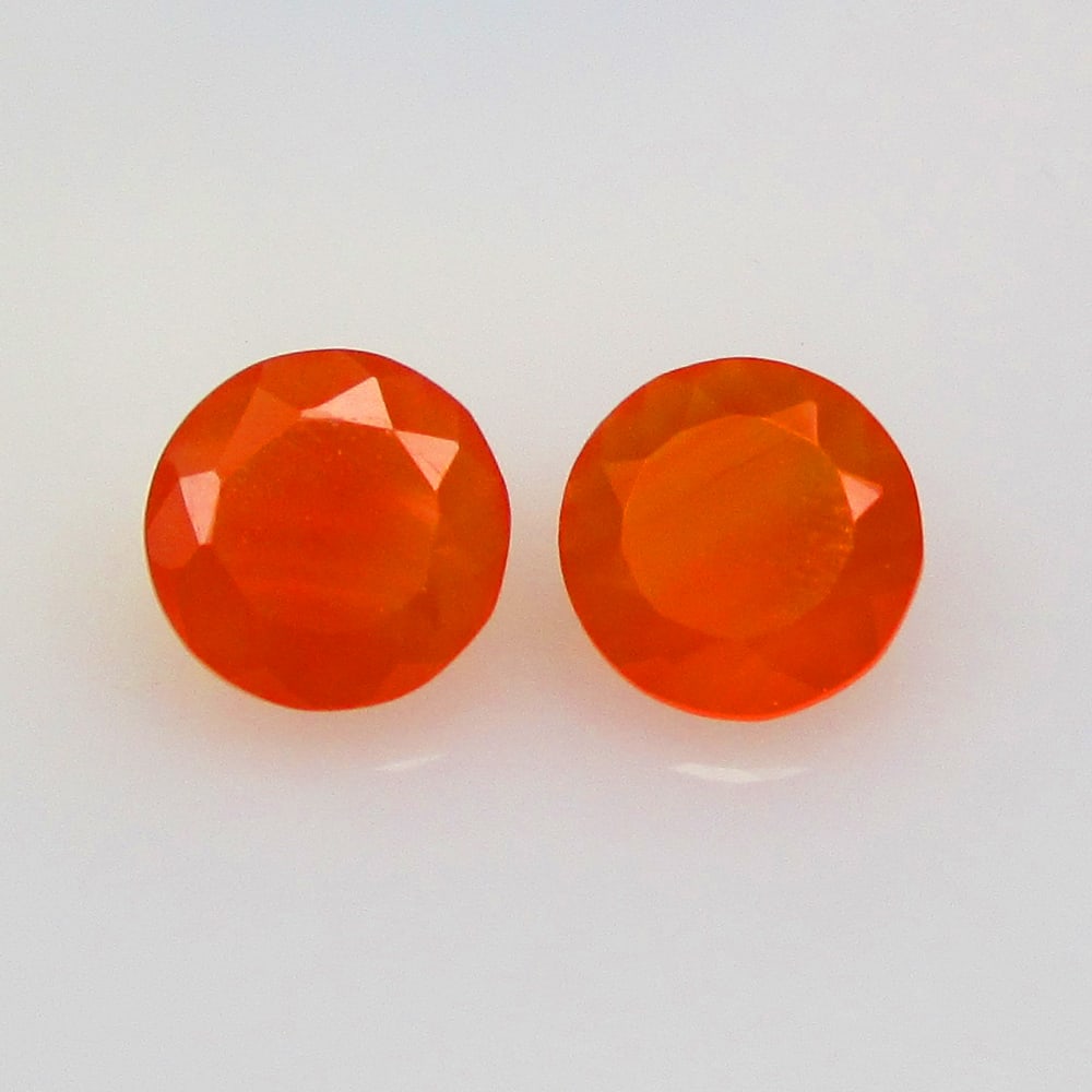 2.38 Ctw Natural Orange Carnelian Round Pair: No Reserve! Title: 2.38 Ctw Natural Orange Carnelian Round Pair Stone Clarity: Semi-Transparent Gemstone:Natural Carnelian MCarat Weight: 2.38 Size/Dimensions: 7.20 x 7.20 x 4.20 mm / 2 Pc's Additiona