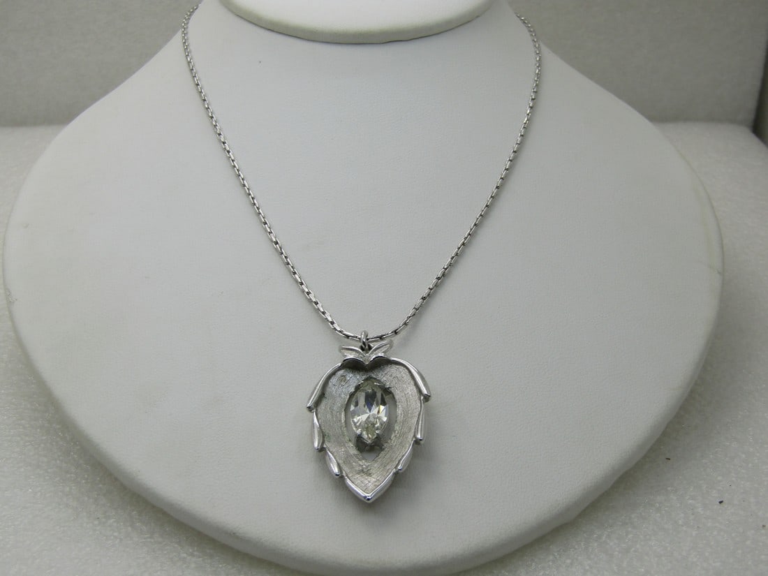 Vintage Rhinestone Leaf Necklace, Sarah Coventry, 1970's, 18": Vintage Rhinestone Leaf Necklace, Sarah Coventry, 1970's, 18" around the stone. 18" silver tone chain that is apx. 1.4 mm wide beadlink design. 1970's. Very good condition. (INV.W.BLMX.14 8 SS2025 J L