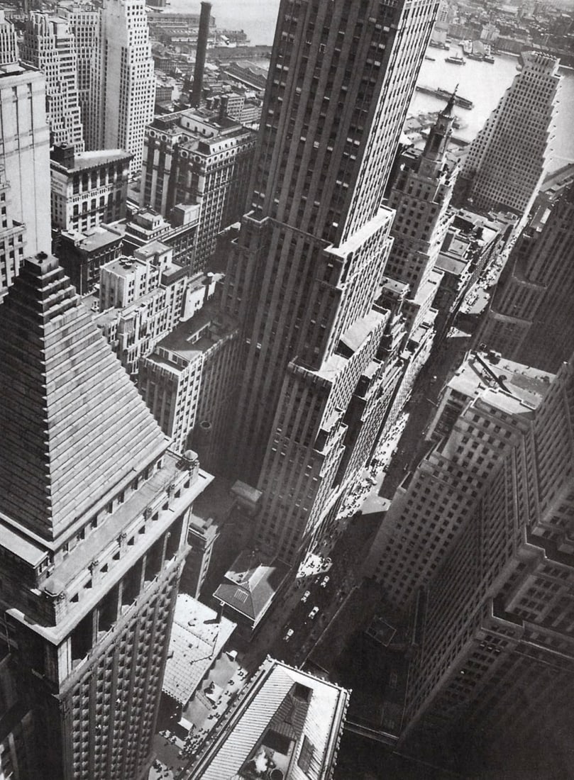 BERENICE ABBOTT - Wall Street w. East River, 1938: Artist: BERENICE ABBOT Print Title: Wall Street w. East River, 1938 Medium: Photo-lithograph Printed in: The USA, 1970’s Image Size: approx. 8.5 x 6.5” Berenice Abbott (1898 – 1991),