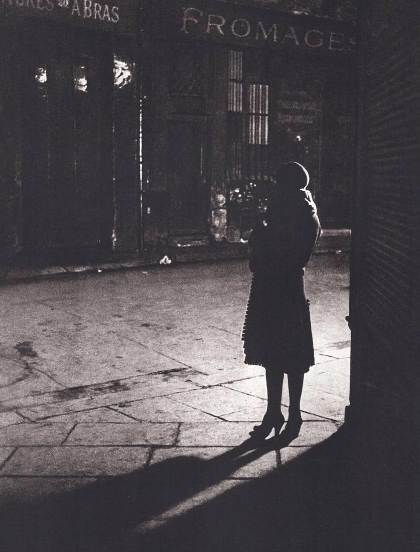 BRASSAI - Young Prostitute at Rue de la Reynie, Paris: Artist: BRASSAI Print Title: Young Prostitute at Rue de la Reynie, Paris Medium: Sheet-fed Gravure Printing Date: 1980's Printed in France Image size approx. 9.5 X 7.5 inches Brassai was a Hungarian&#