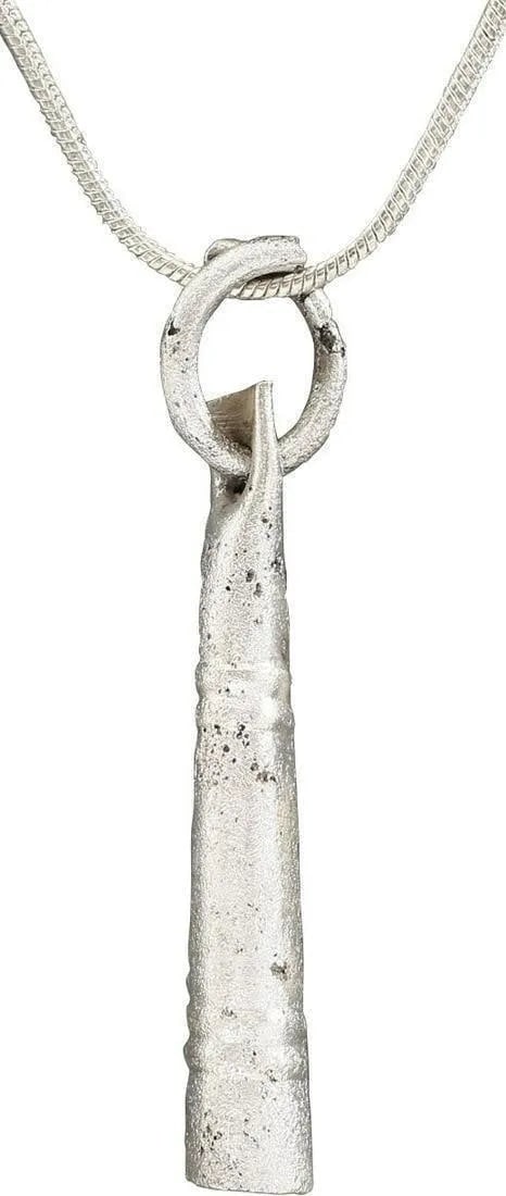 VIKING TUBULAR PENDANT NECKLACE, 9TH-11TH CENTURY AD: Over 1 3/8" in length, of elegantly tapered cylindrical form with double raised rounded rings and pierced-shaped terminal. Open butted at the back. With its original suspension ring with the ends over