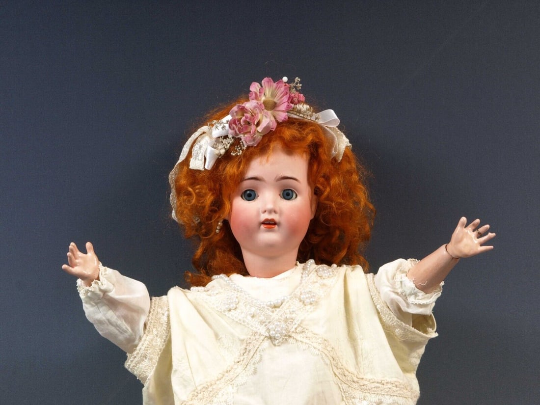 Alt, Beck & Gottschalk Doll 26" Tall Germany Bisque Head Composition body: This is a beautiful Large 26" Antique Alt, Beck & Gottschalk Bisque head and composition body doll, made in Germany. The head of the doll is bisque. She has a beautiful face with large blue, set eyes.