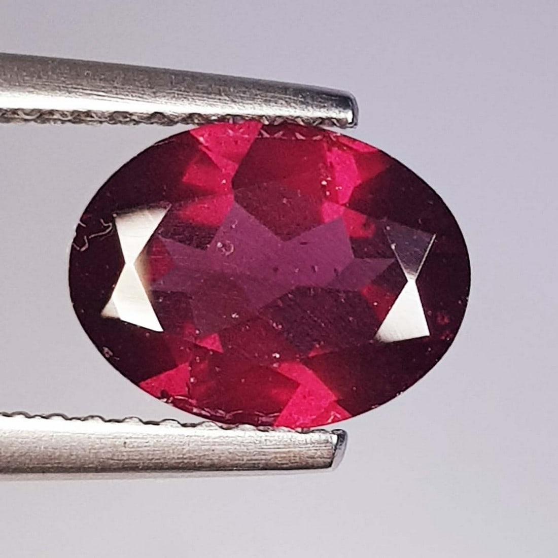 1.94 ctz" Beautiful Purple Pink Gem" Natural Rhodolite Garnet: No Reserve! Title: 1.94 ctz" Beautiful Purple Pink Gem" Natural Rhodolite Garnet Color/Clarity: Purple Pink / IF-VVS Gemstone: Rhodolite Garnet Carat Weights: 1.94 Size: 9.00 x 7.00 x 3.50 Additional 