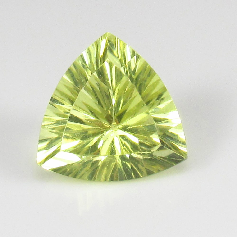 1.58 Ct - Natural Lemon Quartz: No Reserve! Title: 1.58 Ct - Natural Lemon Quartz Description: Gemstone Gemstones:- Carat Weights: Lemon Quartz Size/Dimensions: 1.58 Additional Info:Pieces : 1 No's / Shape : Trillion Cut / Color : G