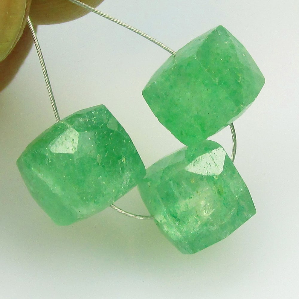 11.52 Ctw Natural 3 Beryl Square Beads: No Reserve! Title: 11.52 Ctw Natural 3 Beryl Square Beads Stone clarity: Transparent Gemstone:Natural Beryl Beads Carat weights: 11.52 Size/Dimensions: 7.40 x 7.40 mm / 3 Pc's Additional info:Very Goo