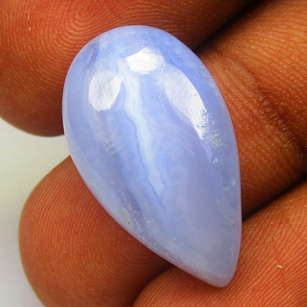 15.70 Ctw Natural Blue Lace Agate Pear Cab: No Reserve! Title: 15.70 Ctw Natural Blue Lace Agate Pear Cab Stone clarity: Opaque Gemstone:Natural Lace Agate Carat weights: 15.7 Size/Dimensions: 24.00 x 13.30 x 6.90 mm Additional info:Excellent P