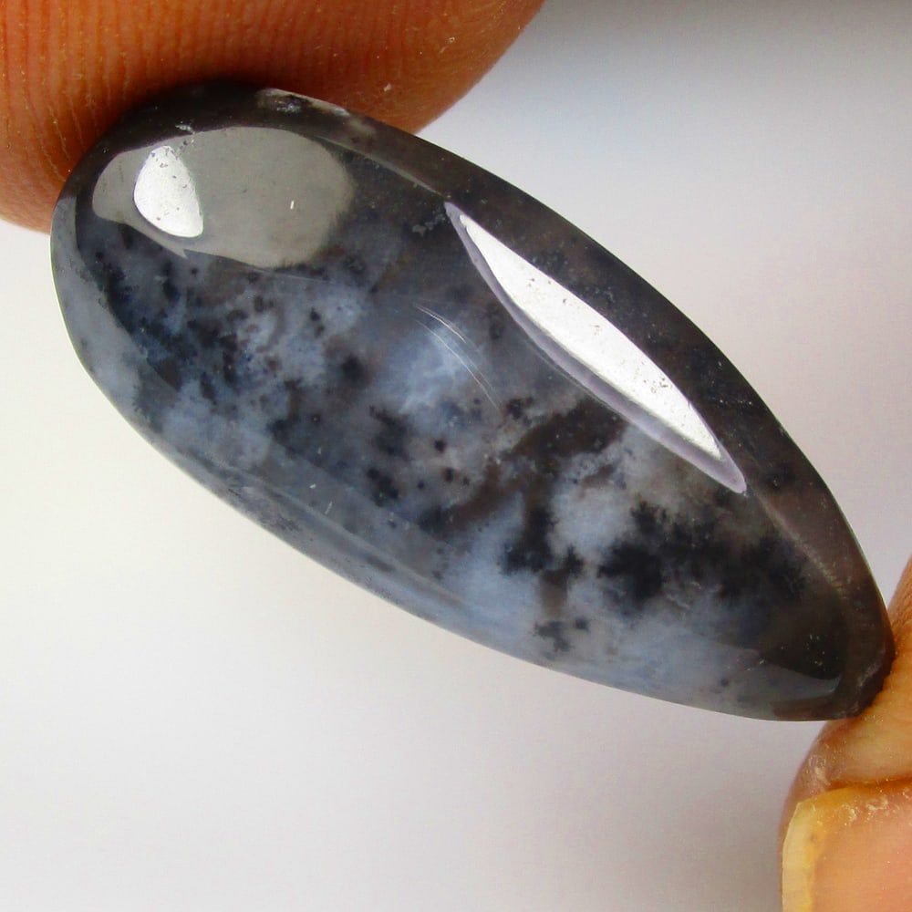 10.31 Ctw Natural Dendrite Opal Trillion Cabochon: No Reserve! Title: 10.31 Ctw Natural Dendrite Opal Trillion Cabochon Stone clarity: Transparent Gemstone:Natural Dendrite Opal Carat weights: 10.31 Size/Dimensions: 24.50 x 9.90 x 5.60 mm Description: