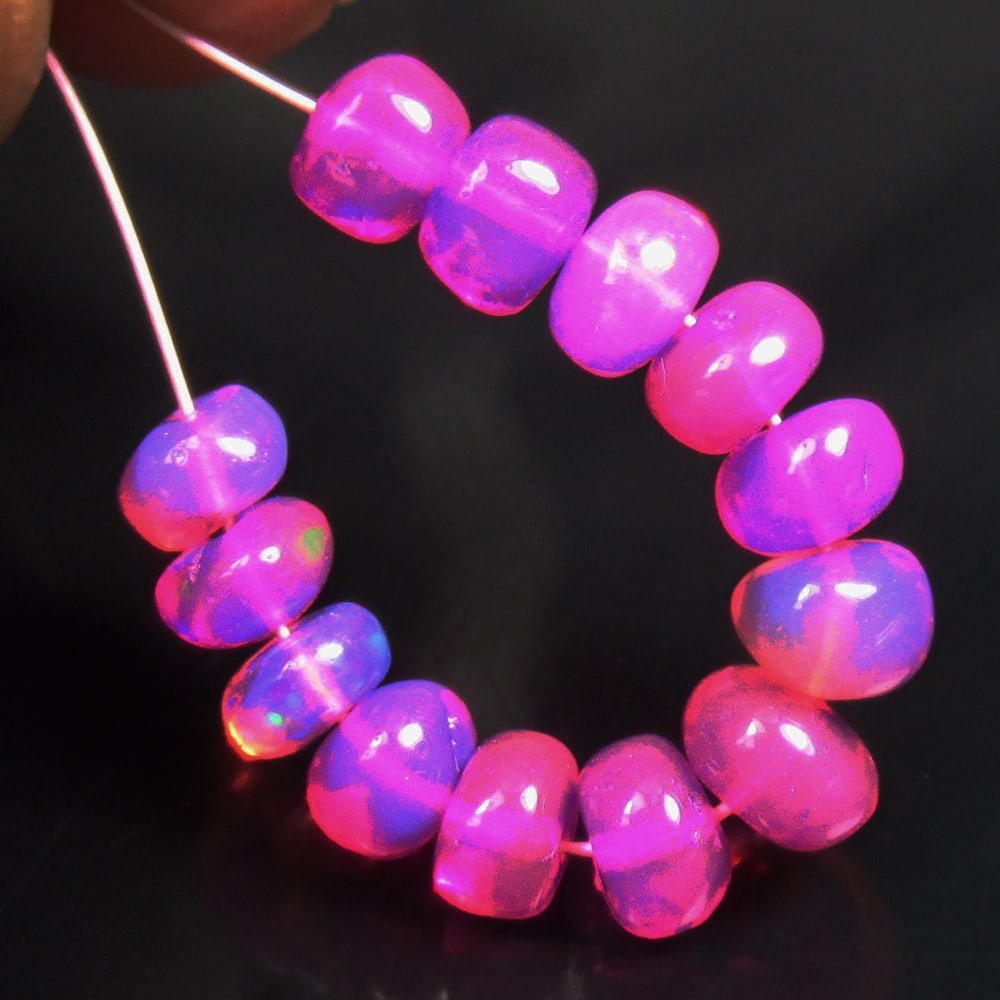 4.08 Ctw Natural 13 Drilled Pink Fire Opal Beads: No Reserve! Title: 4.08 Ctw Natural 13 Drilled Pink Fire Opal Beads Stone clarity: Opaque Gemstone:Natural Opal Beads Carat weights: 4.08 Size/Dimensions: 4.50 to 5.10 mm / 13 PC's Description:Drilled