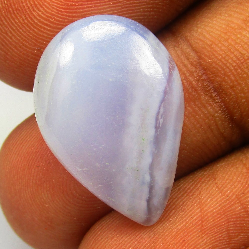 10.96 Ctw Natural Blue Lace Agate Pear Cab: No Reserve! Title: 10.96 Ctw Natural Blue Lace Agate Pear Cab Stone clarity: Opaque Gemstone:Natural Lace Agate Carat weights: 10.95 Size/Dimensions: 22.00 x 14.80 x 4.90 mm Additional info:Excellent 