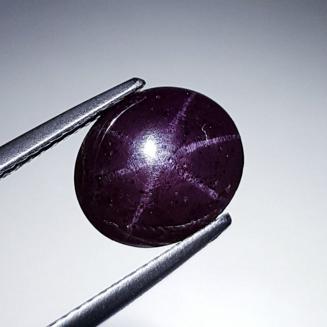 7.35 ctz " Natural Six Rays Star Garnet: No Reserve! Title: 7.35 ctz " Natural Six Rays Star Garnet Color/Clarity: Purplish Red / Opaque Gemstone: Star Garnet Carat Weights: 7.35 Size: 11.00 x 9.50 x 6.10 Additional Information: Oval / Srila