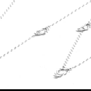 Tiffany & Co Open Heart necklace: Beautiful Open Heart necklace by Tiffany & Co. - In silver 925 thousandths. - Creation of Elsa Peretti. - Three openwork hearts. - Weight : 4,17g approximately. - In very good condition. Reserve: $218