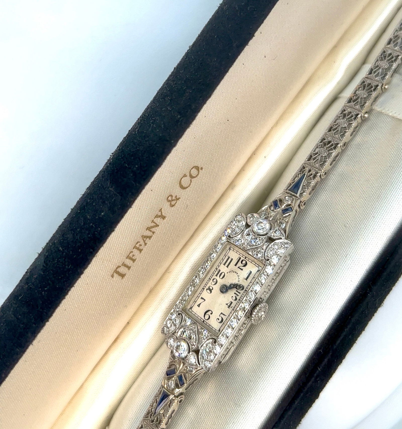 Antique Art Deco Tiffany & Co Platinum Diamond Watch: Vintage from the 1920s Band material: White gold Materials: Platinum Power: Mechanical Readout: Analog Style: Art deco Antique Platinum diamond watch from the art deco period Band is solid 14 karat wh
