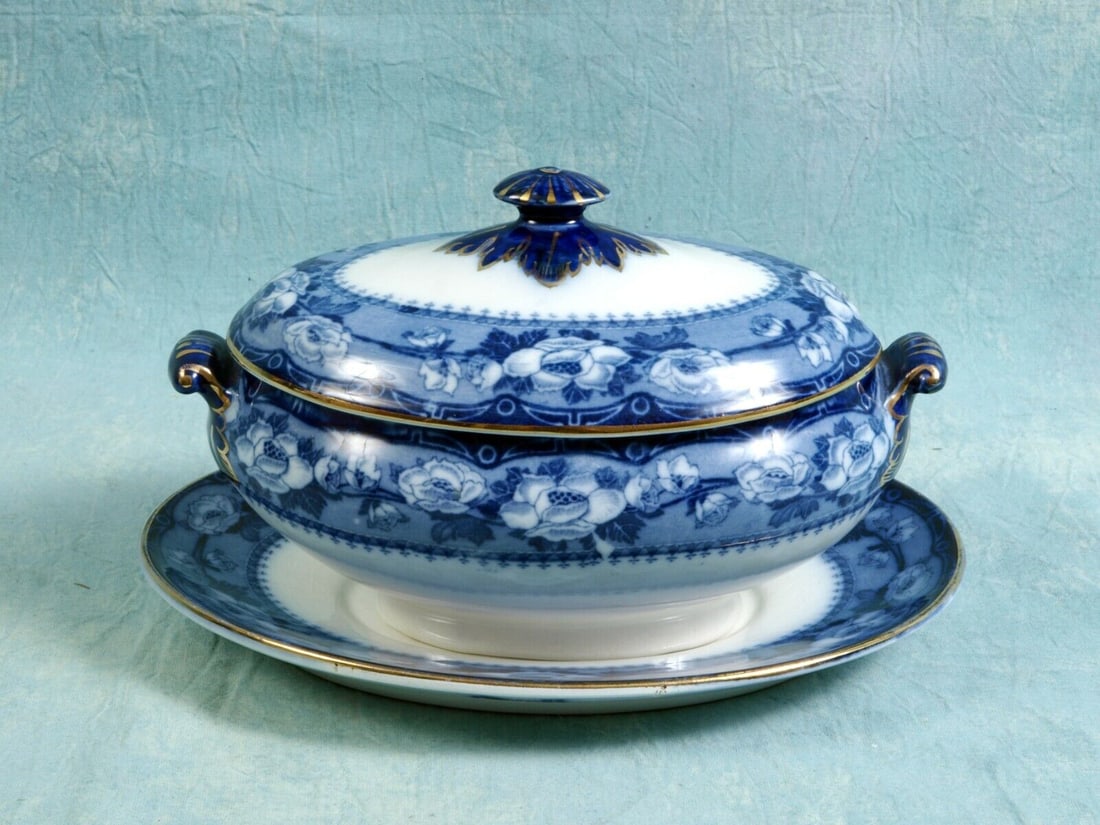 Bishop Stonier Gravy Victorian 3-Piece Sauce Gravy Tureen 1891 Khan England: This very rare antique Flow Blue Small Covered Gravy/Sauce/Tureen and underplate, made by Bishop Stonier This mark (Caduceus) was registered as a trade mark by Powell & Bishop in 1876 the mark was als
